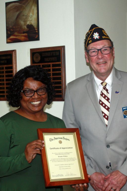 photo of Certificate of Apprecation recipient